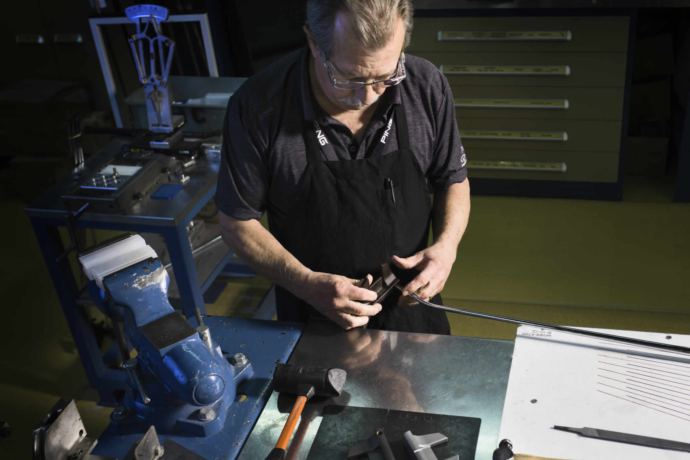 Technician assembling a custom putter