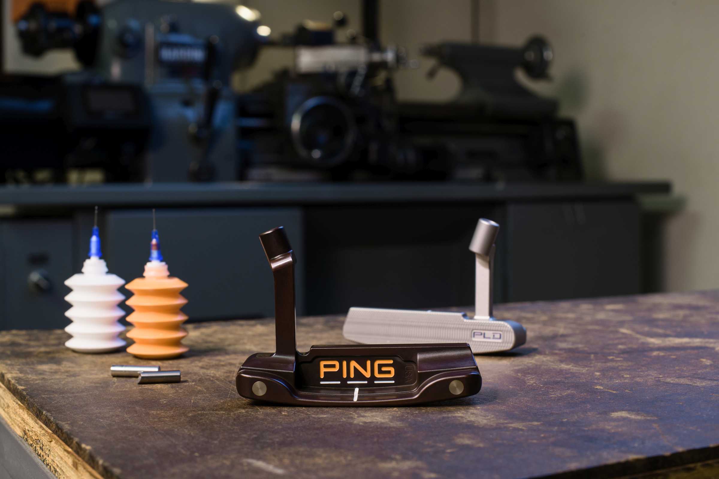 Customized putter heads on a table