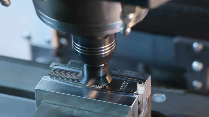 Milling machine surfacing a putter face