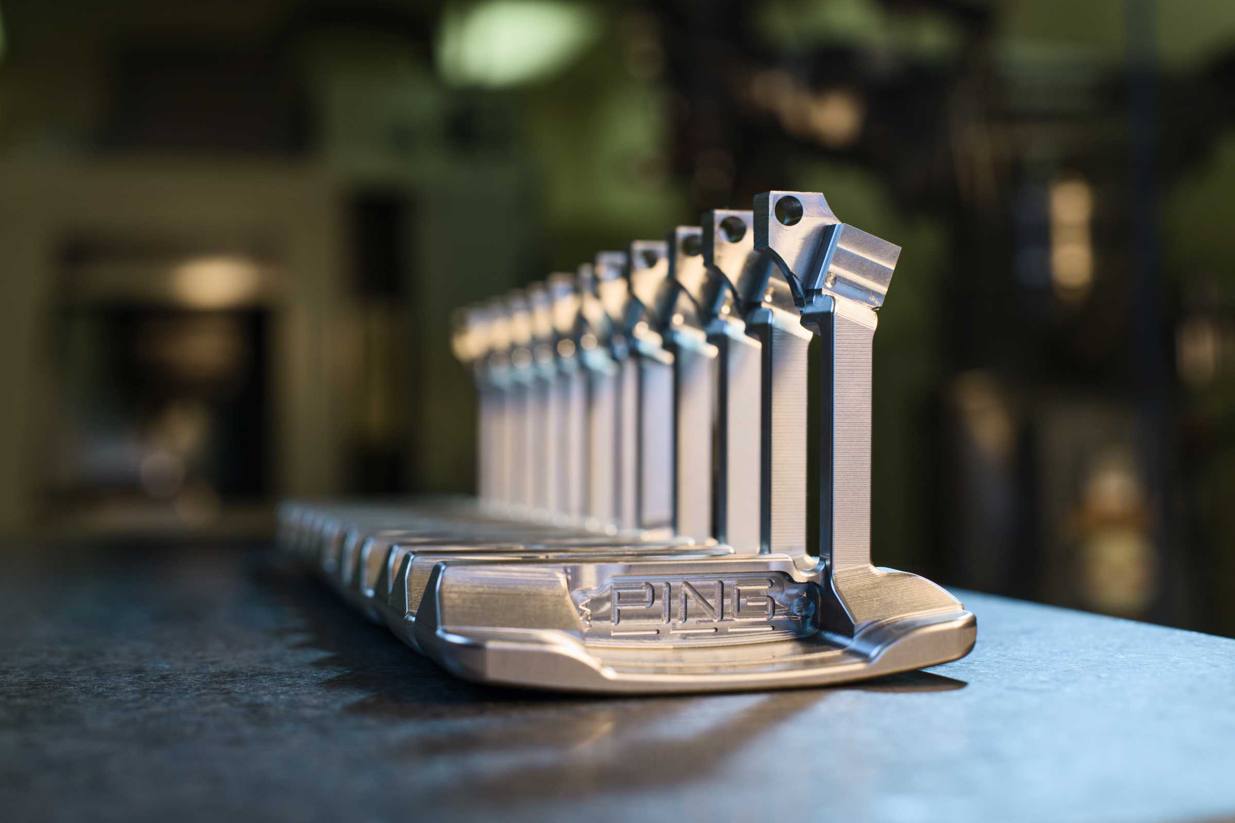 Row of unfinished PLD putters